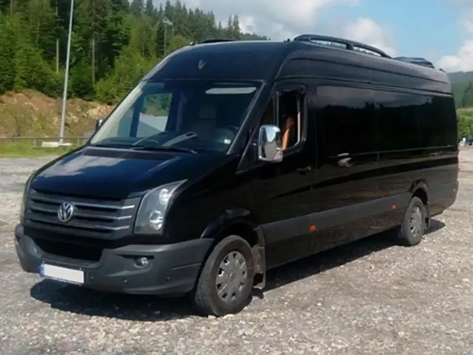 a black van parked in a parking lot