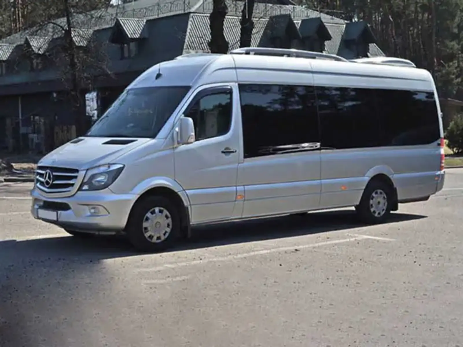 a white van parked in a parking lot